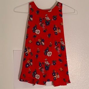 Floral tank with open back